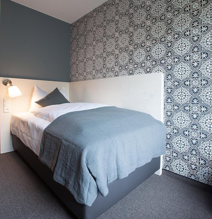 Alpengluehen Smart Hotel Olching Phòng bức ảnh